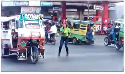 female dancing traffic enforcer valencia bukidnon